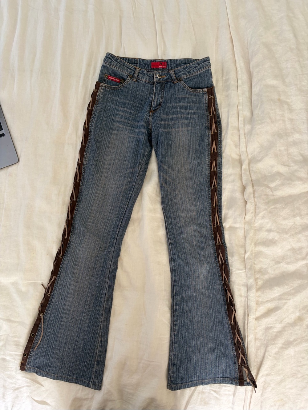 Y2K bootcut low-rise jeans with lace up side detail in size xs